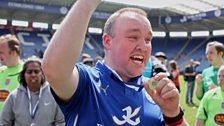 A Leicester City fan becomes overwhelmed