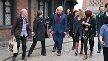 ý Director General Tony Hall walks with some of the cast to the performance area in Broadgate