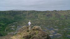 David stands by the Arongo crater, Easter Island.  Now deserted, it was once the site for sacred rituals of a lost culture.