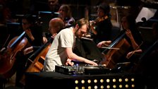 Soloist and BBC Symphony Orchestra performing 'Concerto for Turntables and Orchestra'