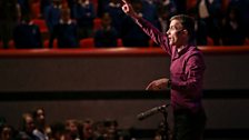 BBC Singer Edward Price leading a warm up with the audience in Birmingham