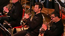 French horn players amid performance in Birmingham