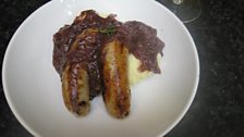 Kim's delicious onion gravy with sausages and mash.