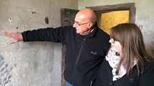 Andrew Martlew & Megan Leyland looking at the graffiti in one of the Richmond Castle cells