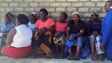 Trinitas with a group of mothers of schoolchildren at a school in Blantyre who cannot afford disposable sanitary products