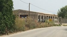 The former Softex toilet roll factory on the outskirts of Thessaloniki, now a government run refugee camp