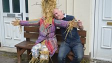 Scarecrow on a bench in Ederney