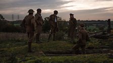 British soldiers survey the battlefield