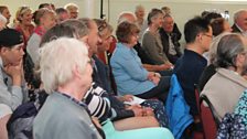 The audience enjoy the programme.