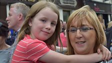 Families enjoying the music