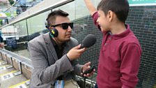 Shehzaad talks to a young Pakistan fan.