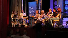 Guests and prestenters up on stage at the end of the Pier theatre