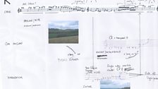 Paul Sartin’s score with photos of the parts of the skyline each section reflects, and his notes.