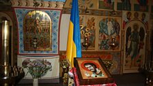 A Ukrainian flag at the altar of a Moscow affliated church