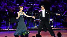 Katie Derham and Aljaz Skorjanec dance at the Strictly Prom with conductor Gavin Sutherland and the tv Concert Orchestra