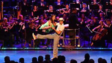 Aljaz Skorjanec and Janette Manrara dance at the Strictly Prom with conductor Gavin Sutherland and the tv Concert Orchestra