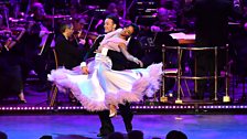 Karen Clifton and Kevin Clifton dance at the Strictly Prom with conductor Gavin Sutherland and the tv Concert Orchestra