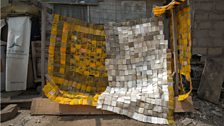 Studio of Serge Attukwei Clottey work  in progress for My Mother's Wardrobe