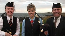 Pipe Major Andy McGregor with pipers Samantha Coburn and Amanda McIlveen