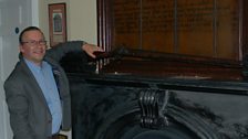 David Hume at Clifton House in Belfast with the gun used by the Clifton Street graveyard watchmen