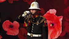 A Royal Marine bugler sounds the Last Post