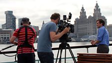 Stephen McGann and camera crew on Mersey ferry