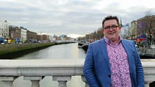 John relaxes on O'Connell Bridge