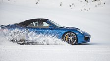 Chris Harris drives the Porsche 911 Turbo S Cabriolet on the snow