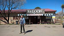 Outside a bar by a gas station in the middle of nowhere