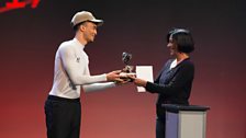 Judge Shobana Jeyasing presents Jodelle Douglas with the Street Dance trophy