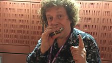 Leo Sayer playing his Harmonica