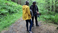 Sinead Rooney recording thick in the forest of the Mournes