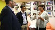 Guests chatting in the green room