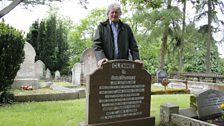 Charlie at his grandparents grave