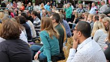 The audience on their Hay Bales