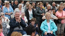 Crowds gather in the square for Hugo's show