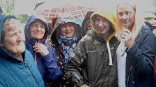 Singing and dancing in the rain in Kesh