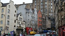 Walking through the Grassmarket past Victoria Street