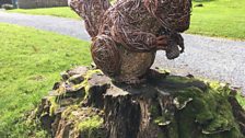 A red squirrel sculpture at Allan Bank, Ambleside