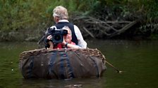 Filming in a coracle