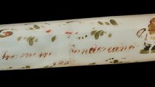 Glass rolling pin, once contained a child’s caul used by fishermen as a charm against drowning, Sunderland, 1855.