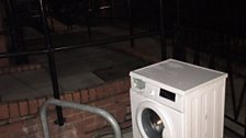 Joe Fowler's Washing machine outside local swimming pool.