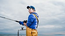 Annie Gilbert, fisherman, on board her boat the Happy Hooker