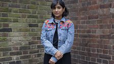 Young lady in floral denim jacket