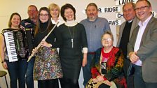 Helen Mark in Ballycarry with guests on the Christmas Kist