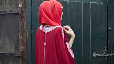 Red hijab, red dress and bling