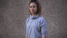 Grey polo neck with glasses