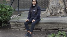 Black sweatshirt, black trainers and bling