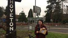 Anna at the village sign in Hoveton