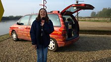 Becky Betts, the original Treasure Quest clue-hunter, with the first radio car the show used in 2008